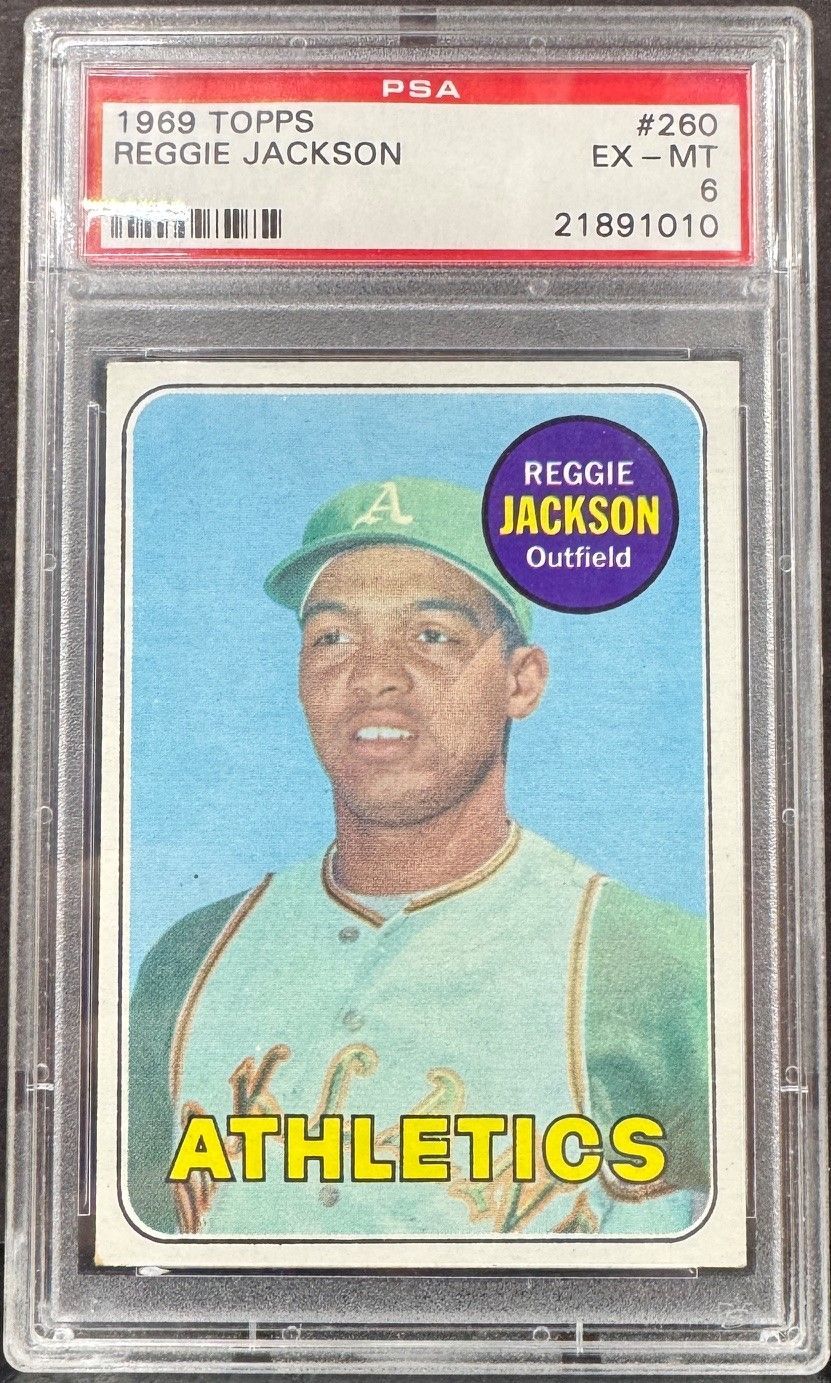 Reggie Jackson baseball card in PSA holder, showing Athletics uniform and “THE STICK” badge