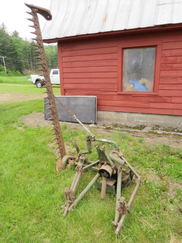 Old farm sickle bar mower.
