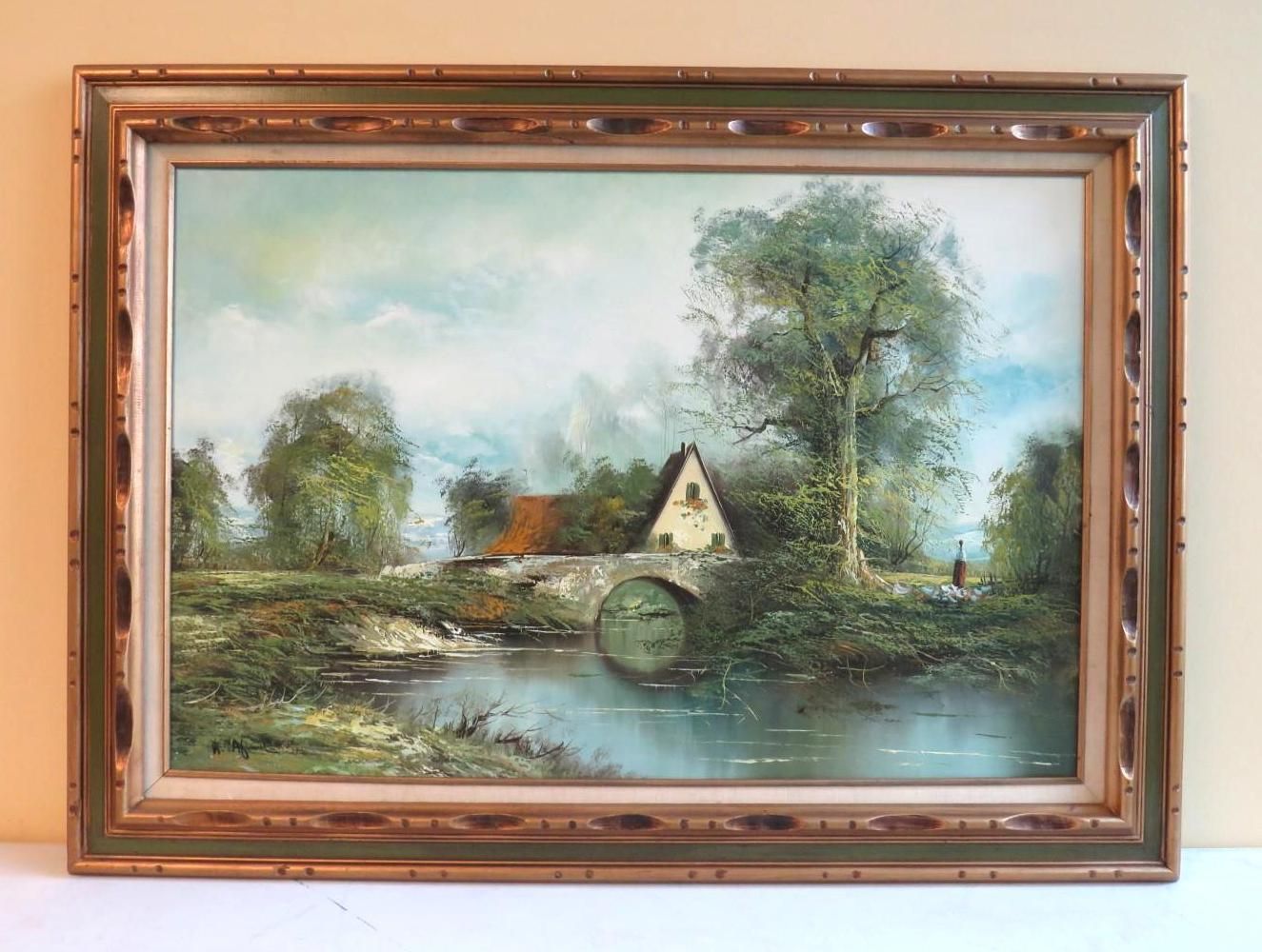Oil painting of a stone bridge over a river, with a house, trees, and cloudy sky. Framed in gold.