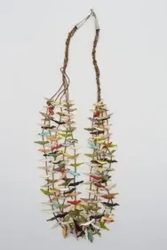 Beaded necklace with a cascading design, featuring colorful, bird-shaped pendants.