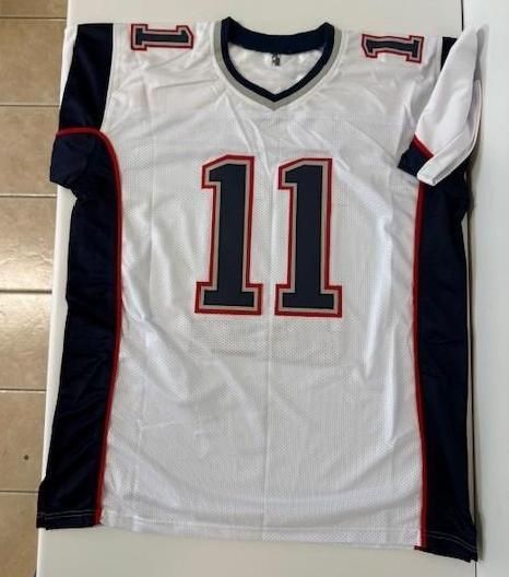 White New England Patriots jersey with number 11 in blue with red trim.