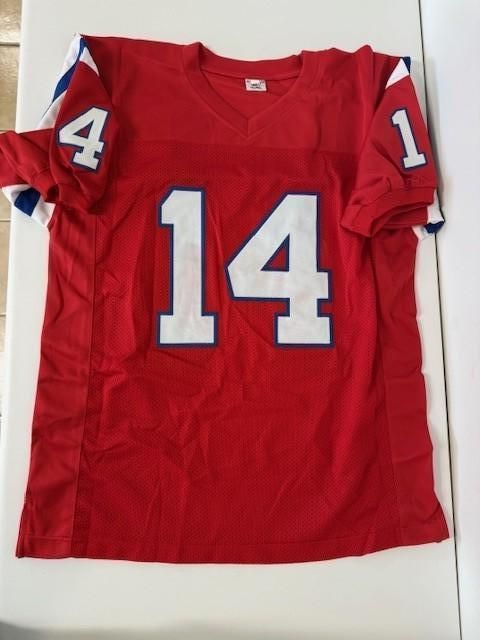 Red football jersey with the number 14 in white, and the number 14 on the sleeve.