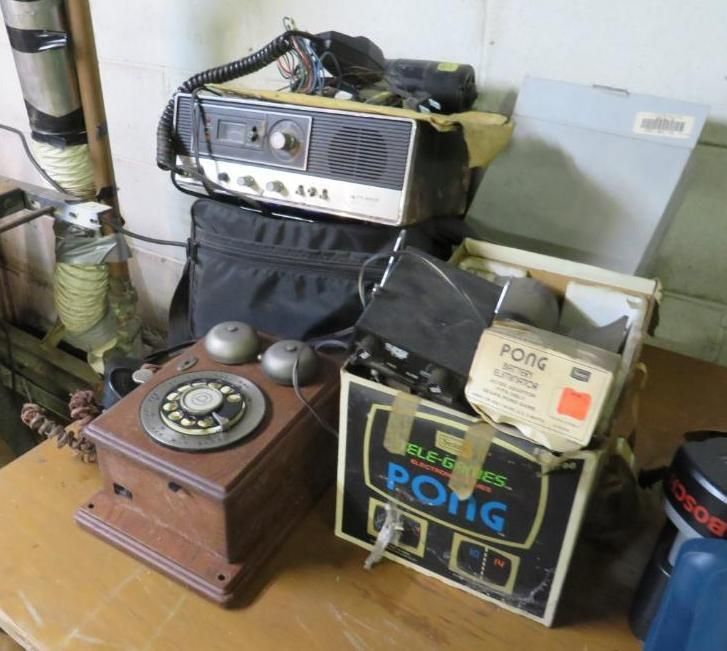 Pile of vintage electronics: CB radio, rotary phone, 