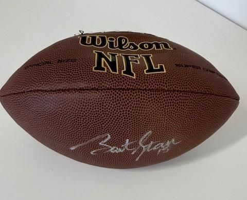 Brown Wilson NFL football with Bart Starr signature.