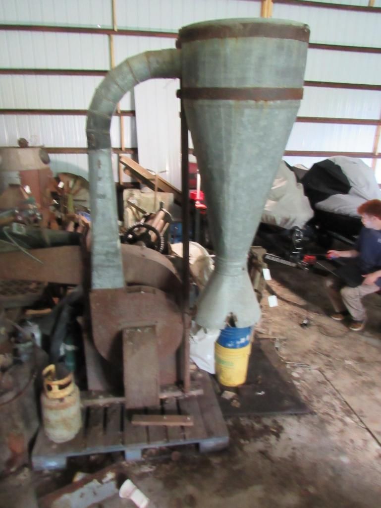 Industrial dust collector in a workshop.
