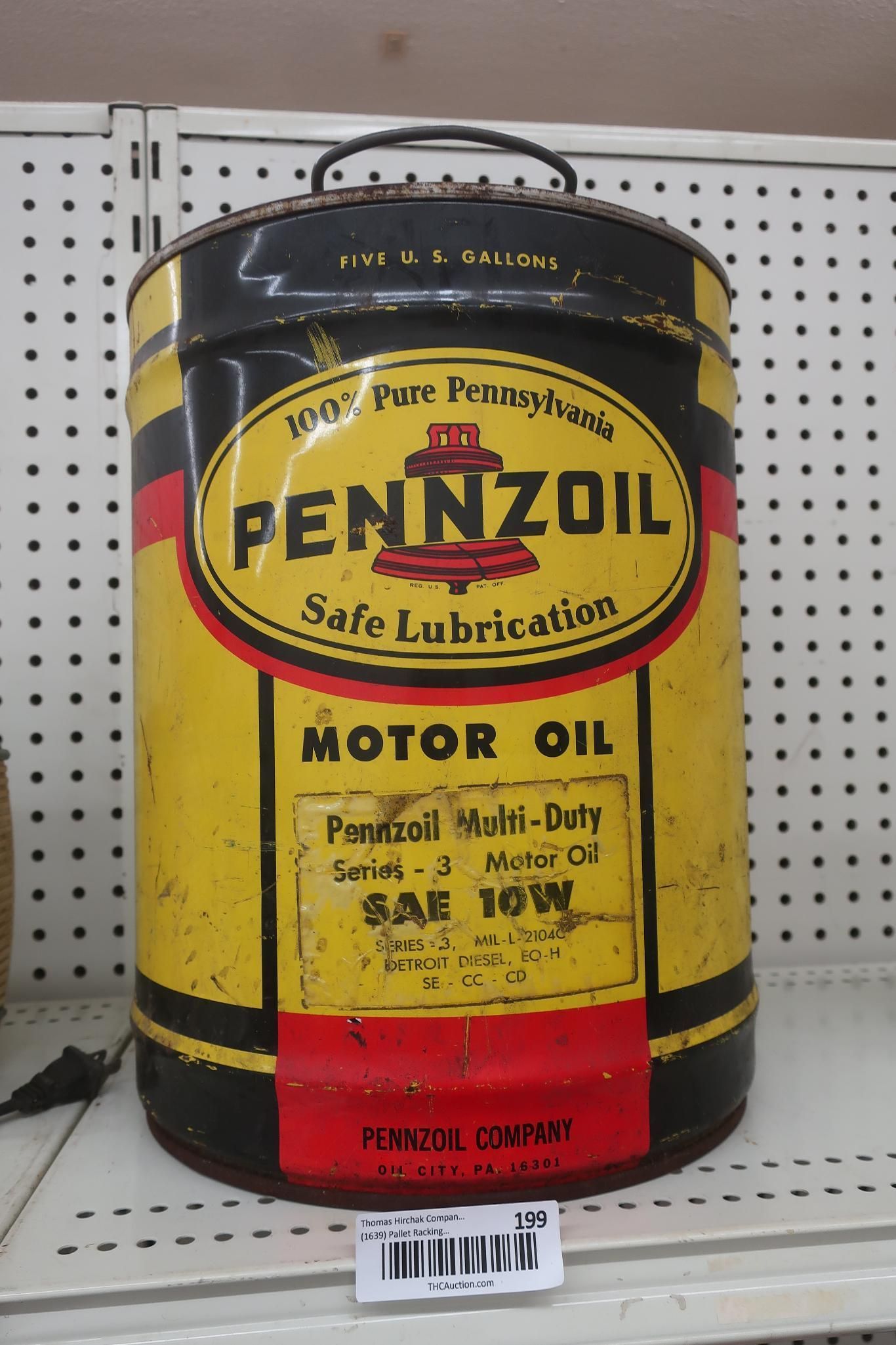 Vintage Pennzoil motor oil can, yellow with black and red accents, label reads