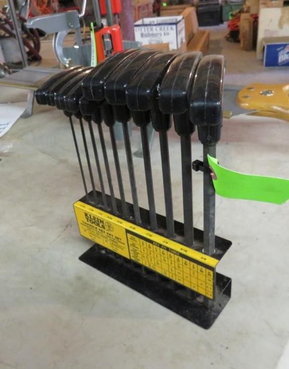 Black hex key set in a yellow and black stand, likely for tool organization.