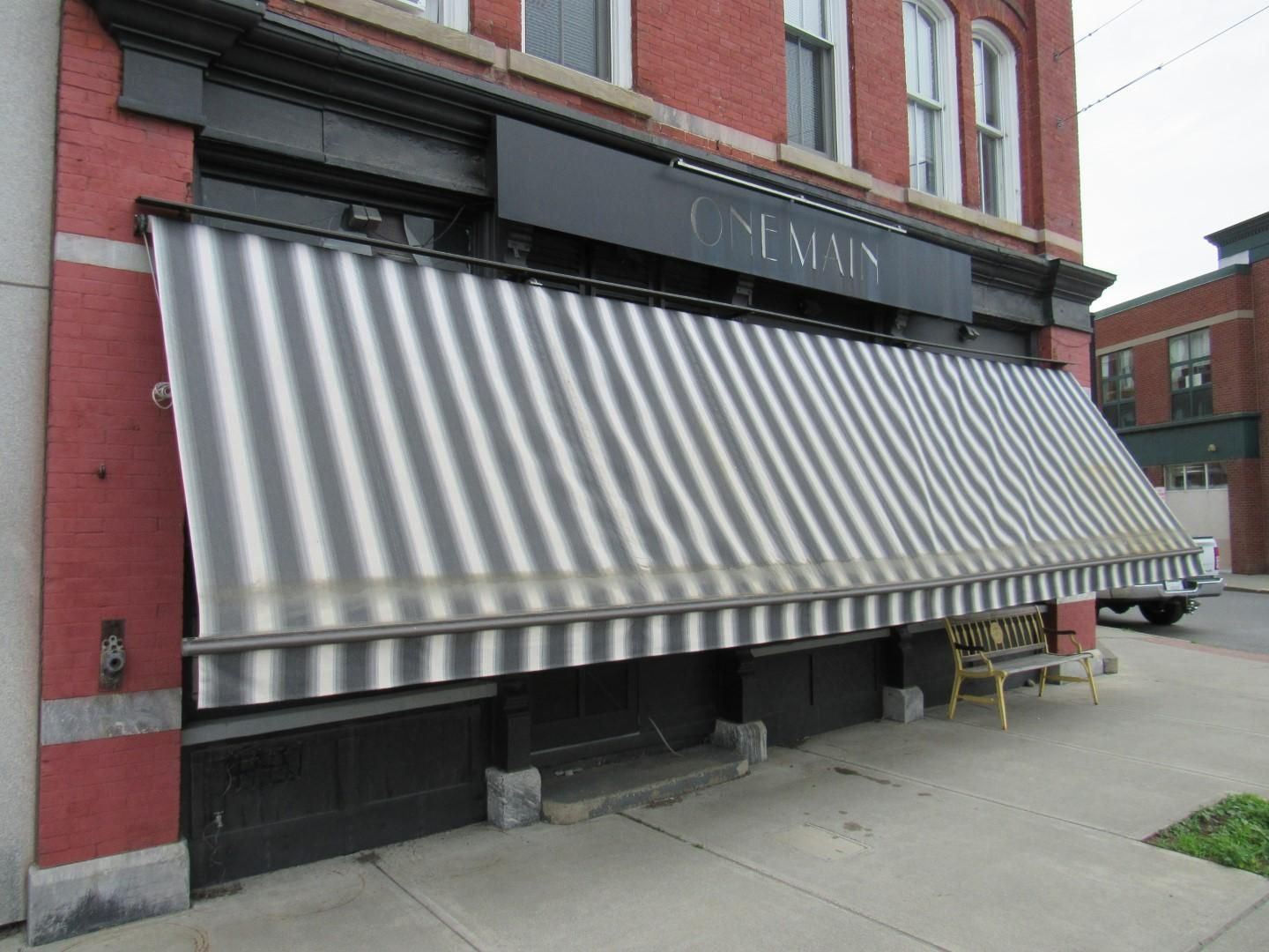 Black and white striped awning.
