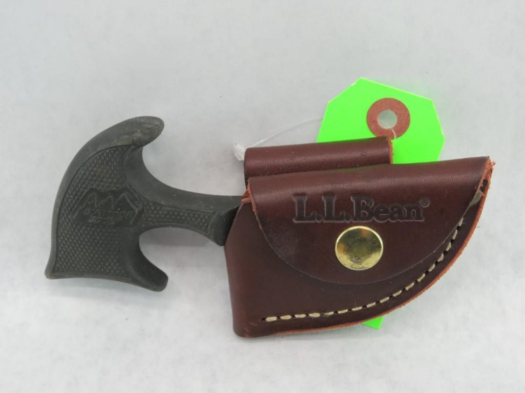 Black push dagger with brown leather L.L.Bean sheath, set against a white background.