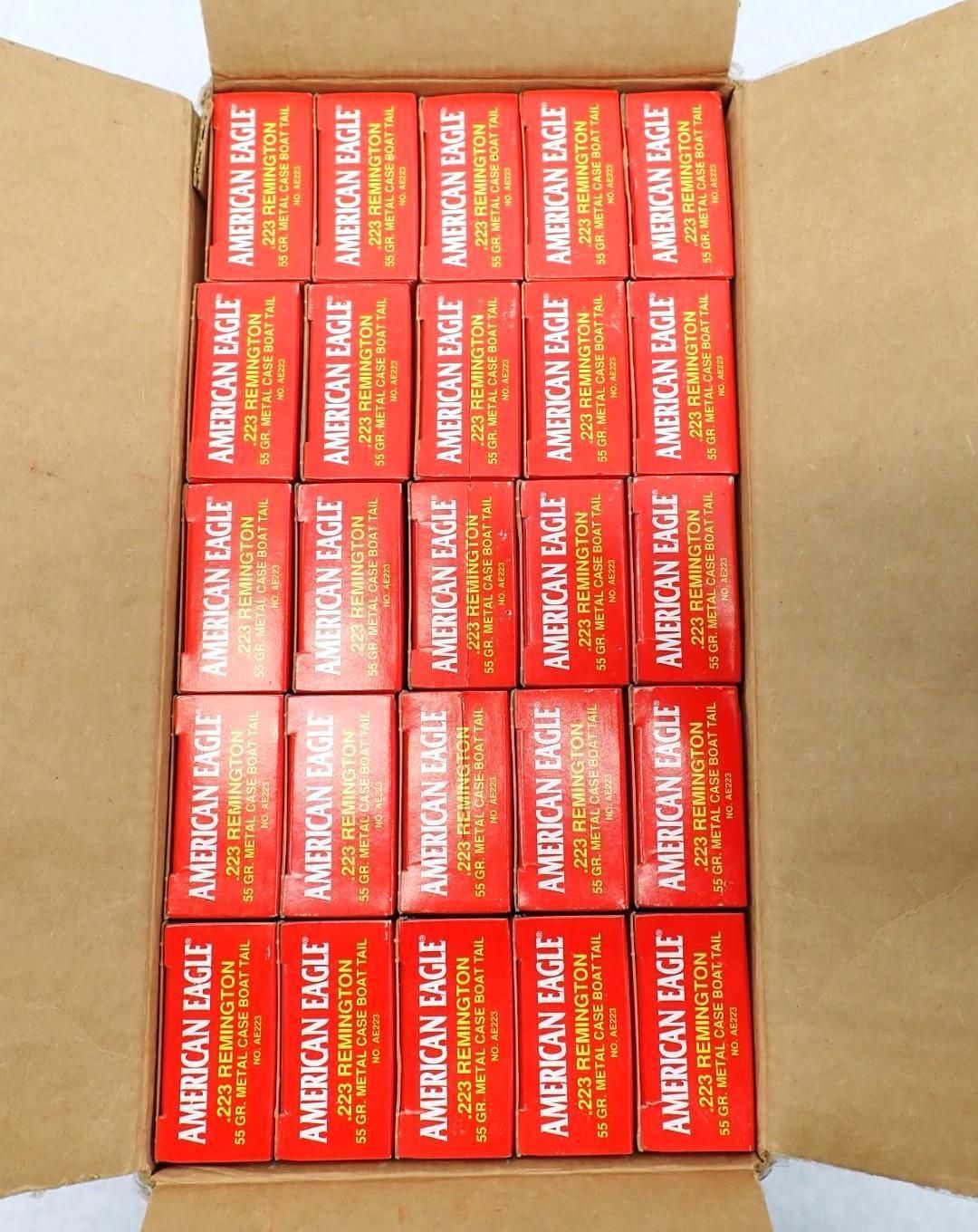 A cardboard box filled with dozens of red boxes of
