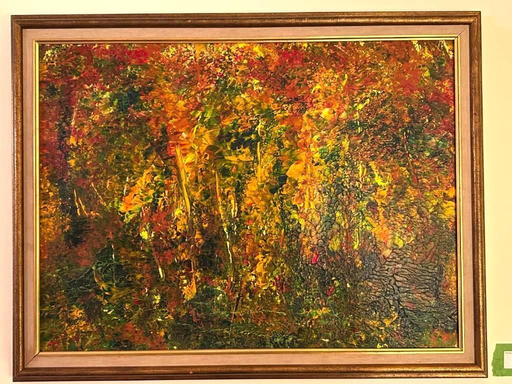 Abstract painting of foliage in autumn colors. Framed artwork.