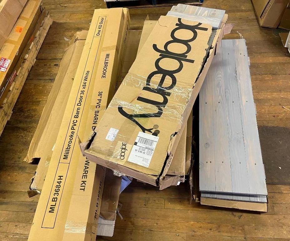 Boxes of flooring material on a wooden surface.