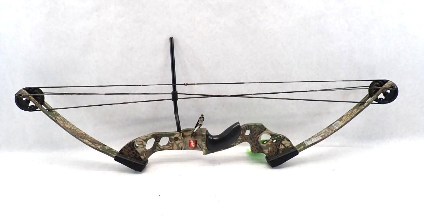 Camouflage compound bow with black limbs and strings on a white background