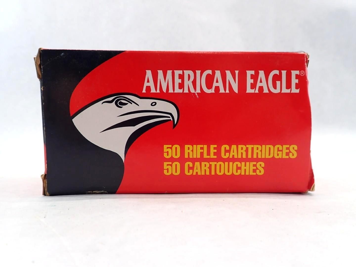 Box of American Eagle rifle cartridges, red and black, with eagle head logo.