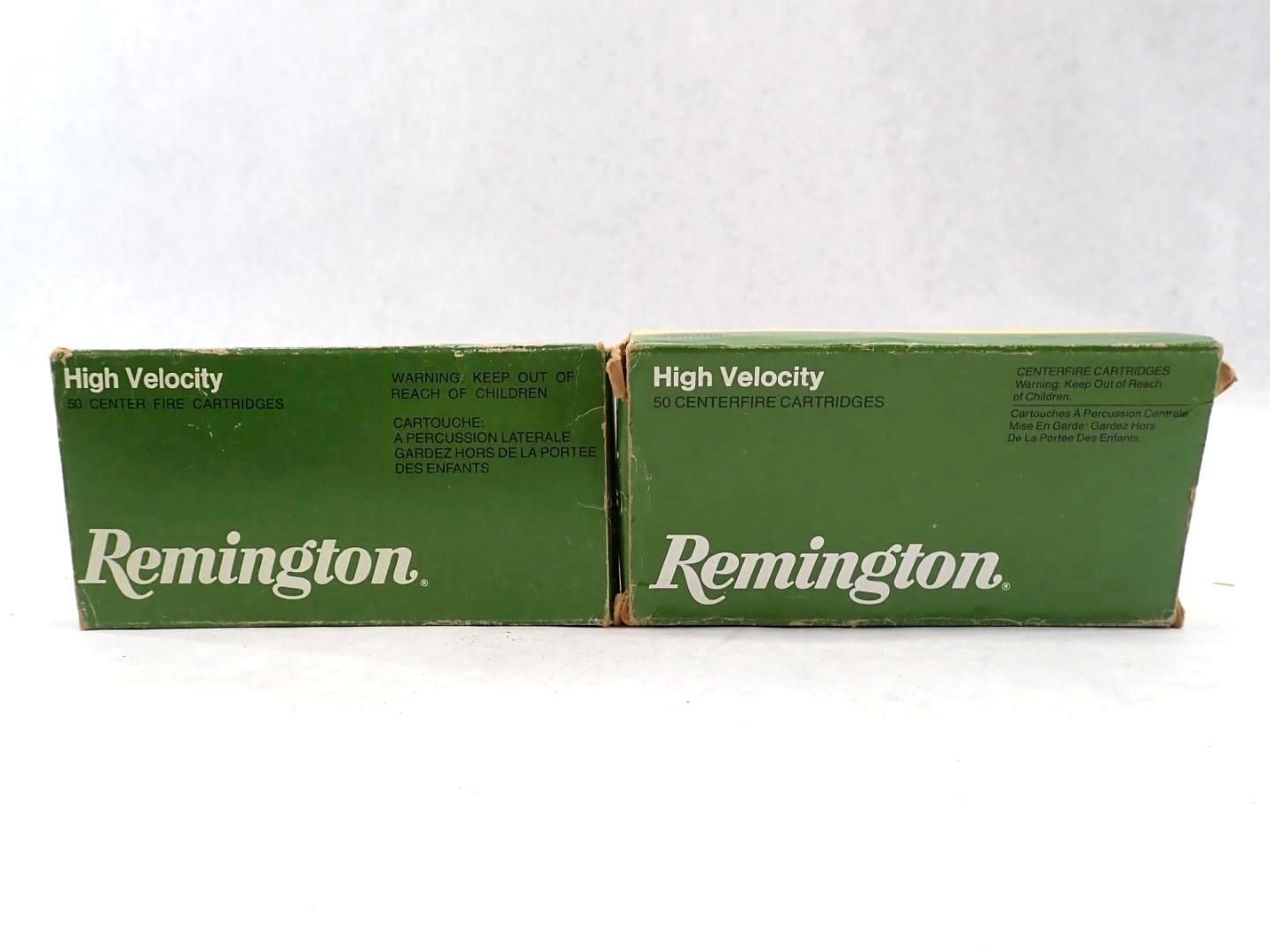 Two green Remington boxes, labeled