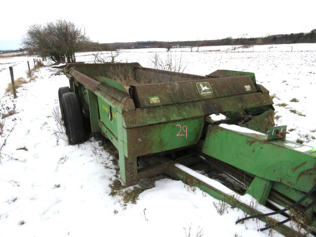 A John Deere manure spreader.