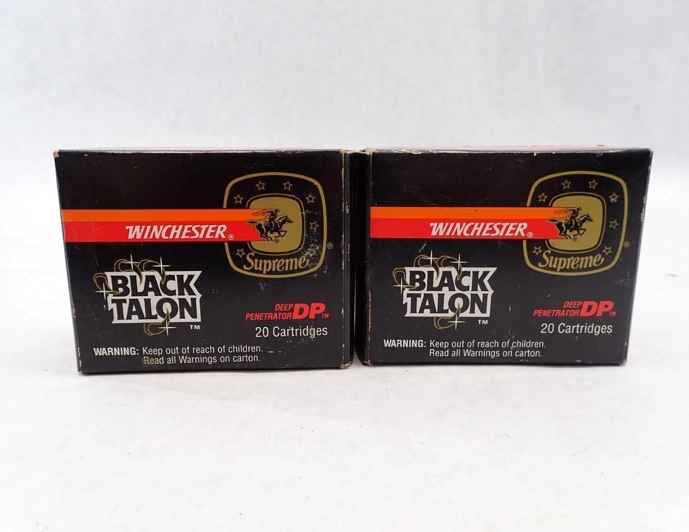 Two boxes of Winchester Supreme Black Talon ammunition. Black boxes with orange stripe, gold logo, and white text.