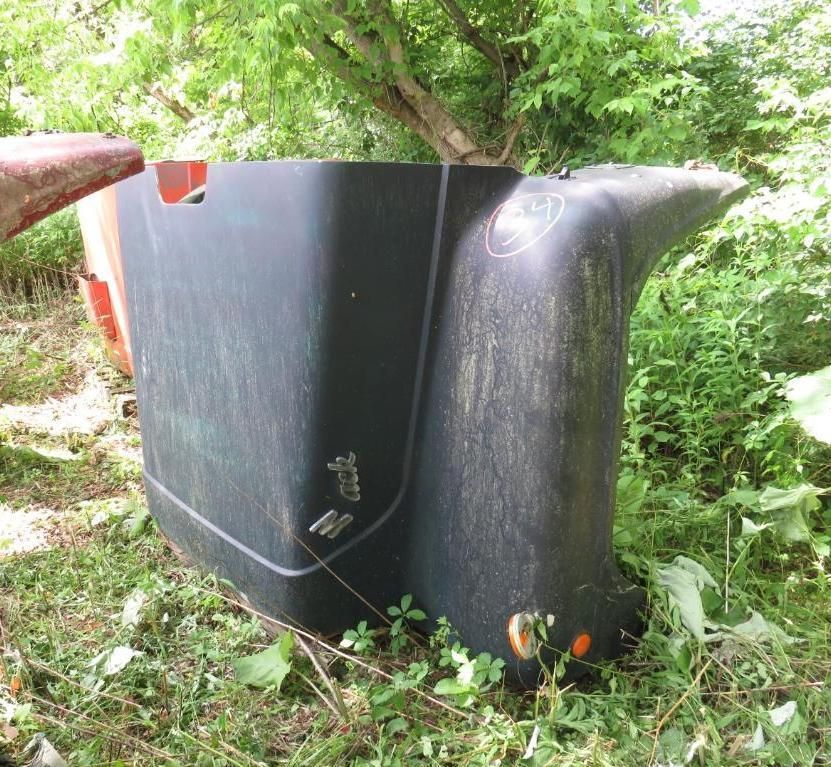 Black and red vehicle body panels.