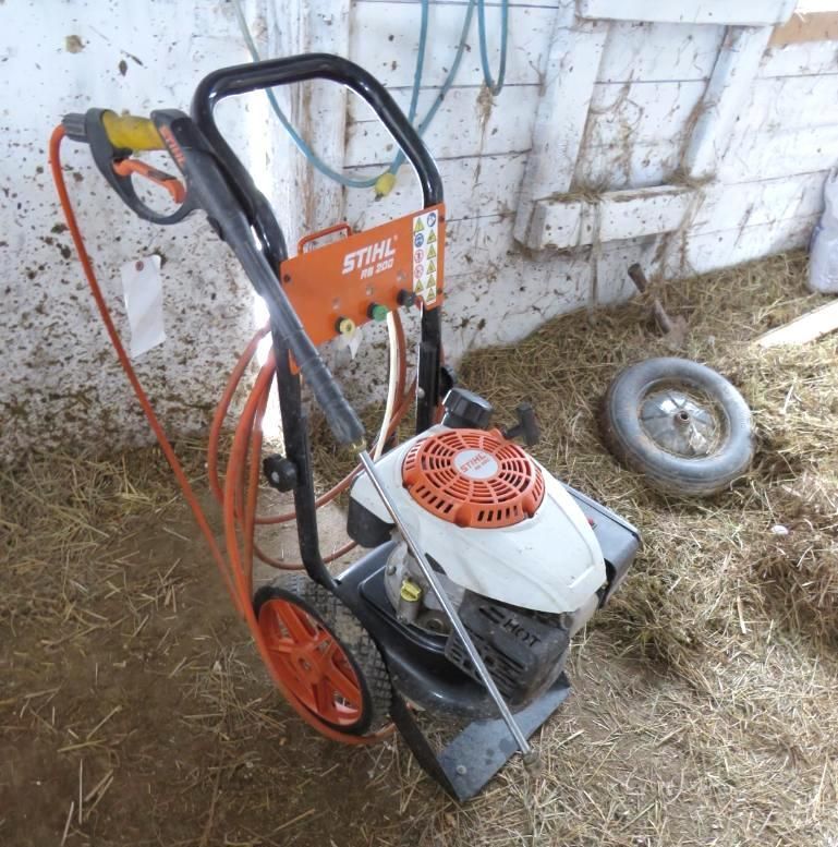 Stihl pressure washer, orange and black.
