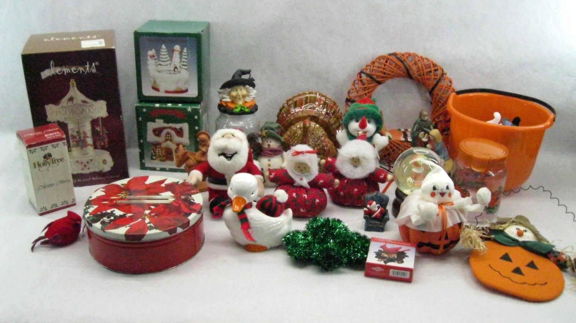 Christmas and Halloween decorations including Santas, snowmen, and a pumpkin.