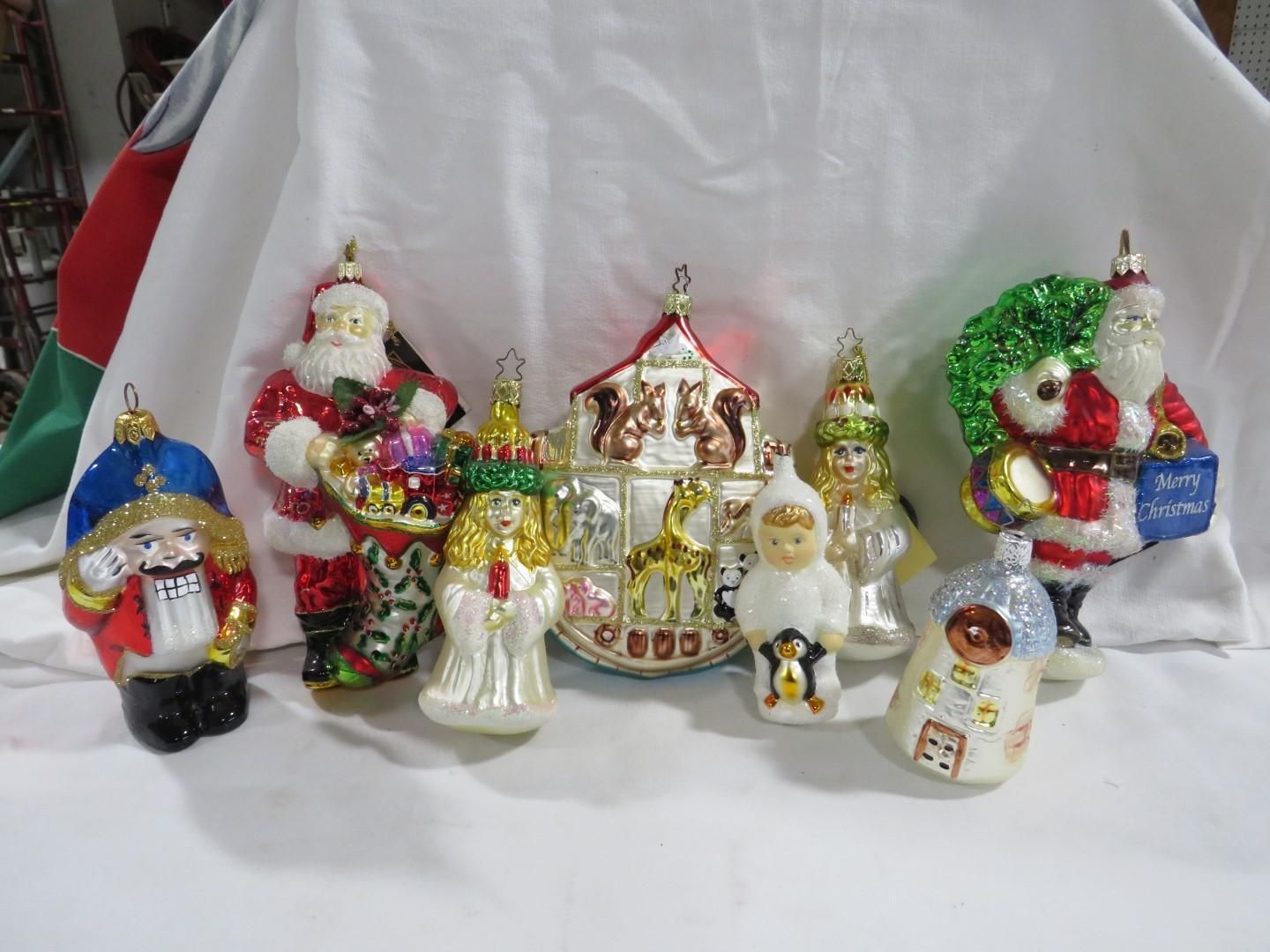 Christmas ornament collection featuring Santa, carousel, nutcracker, and other festive figures.