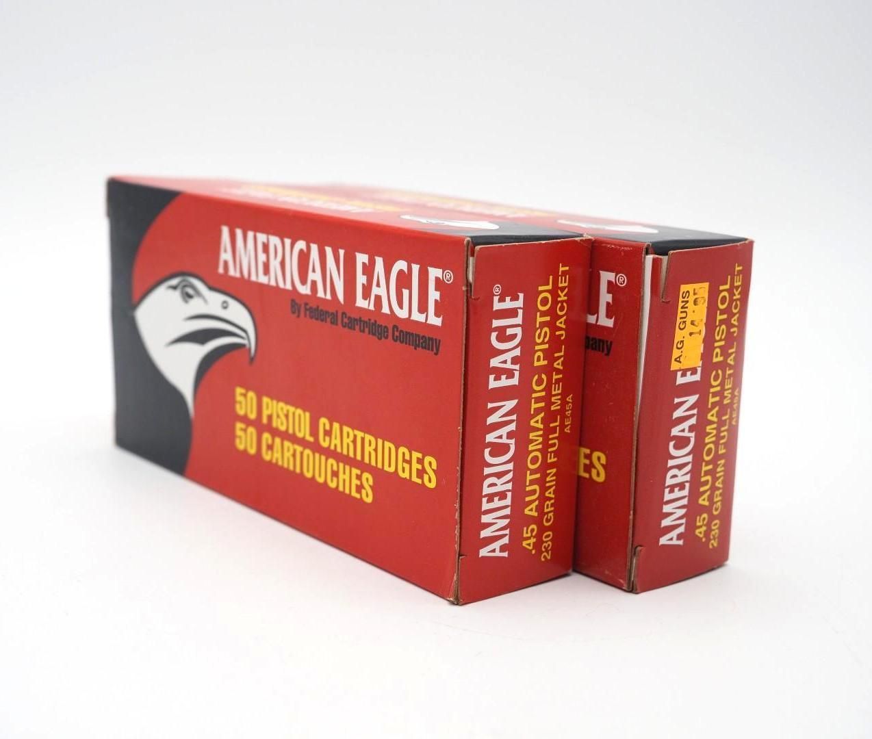 Red American Eagle pistol cartridges stacked on a white background