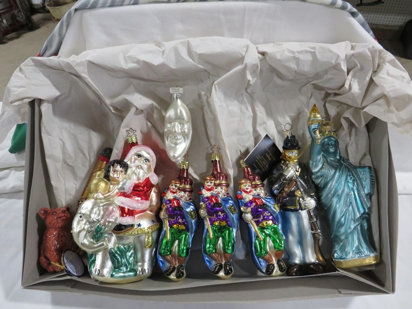 Box of Christmas ornaments: Santa, soldiers, angels, Lady Liberty, and various designs in glass.