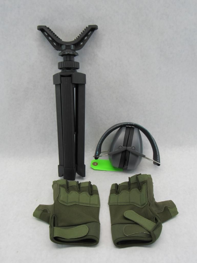 Tripod rest, hearing protection, and olive green fingerless gloves on a light background.