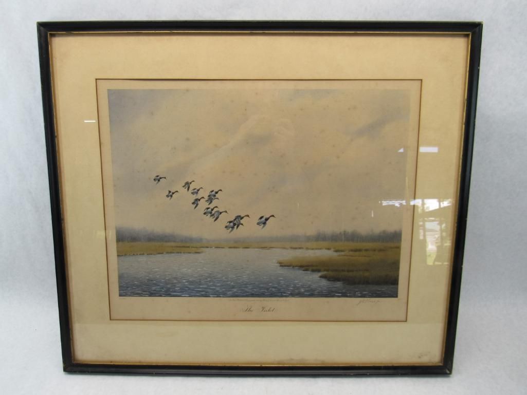 Ducks flying over a river, with marshland and a cloudy sky in a framed painting.