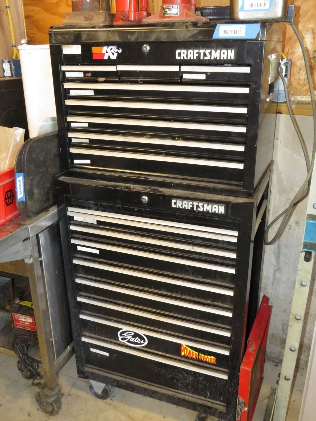 Black Craftsman tool chests stacked; upper one has a K&N sticker.