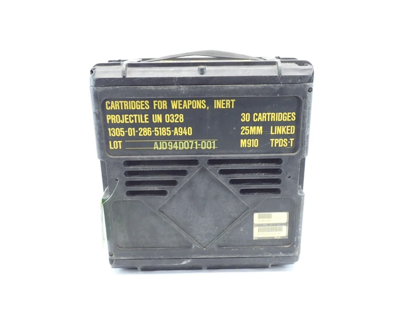 Black equipment case with yellow stencil labels and a metal handle on top