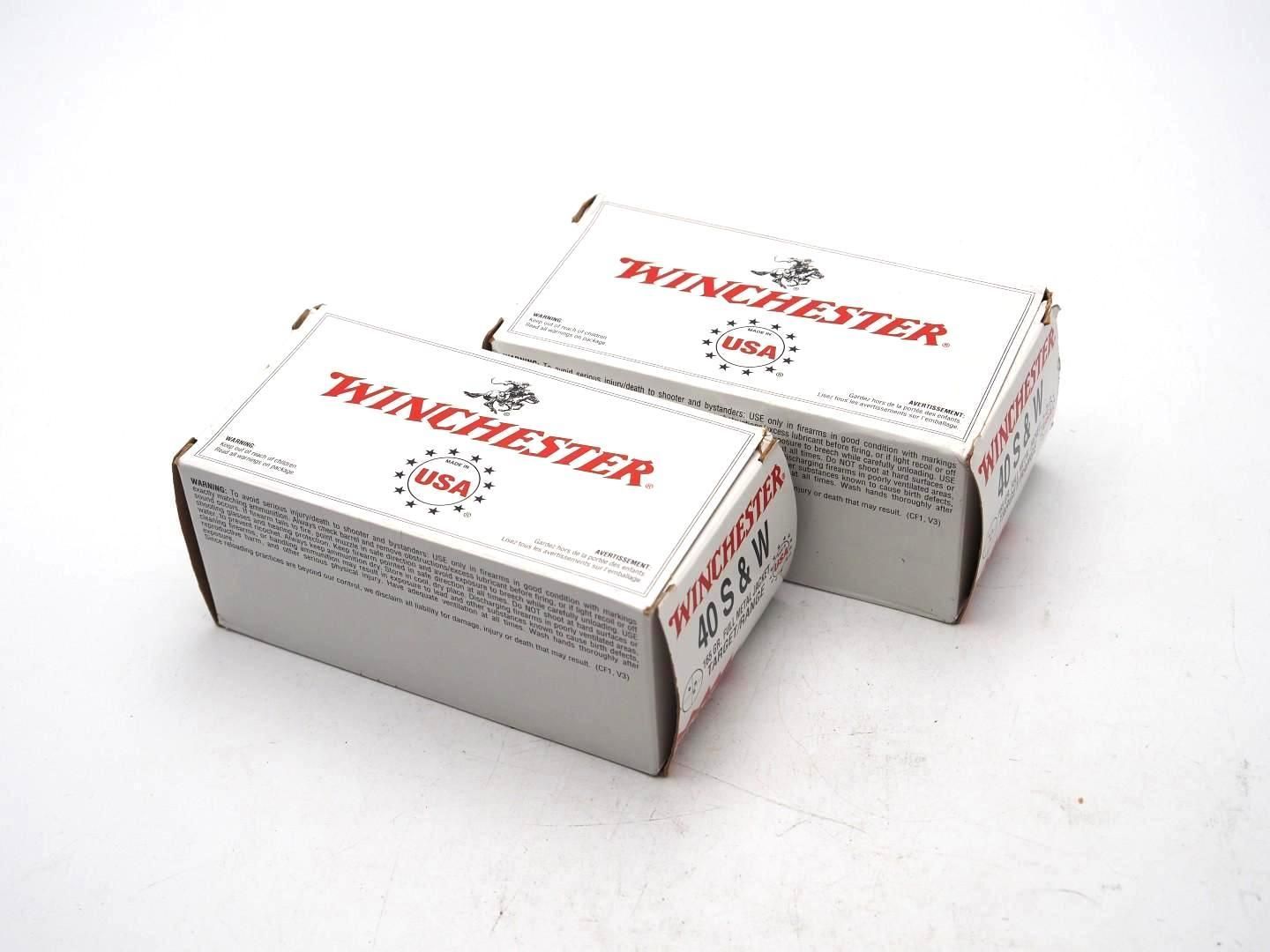Two Winchester ammo boxes with red text on a plain white background