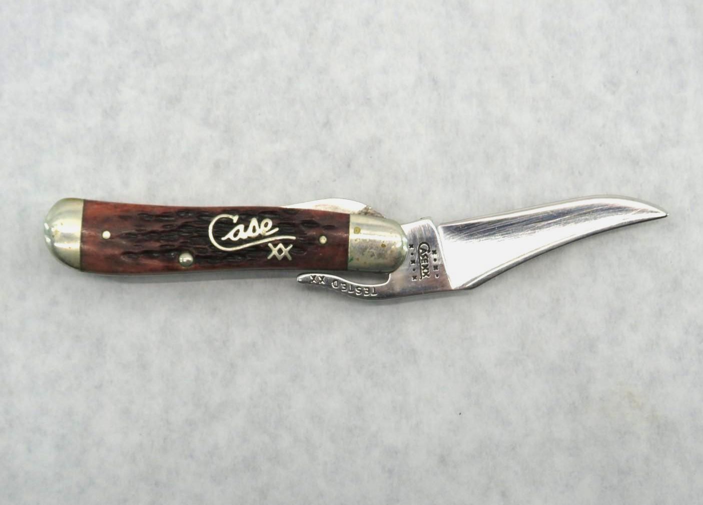 Case XX stag-handled bird knife on a light background.