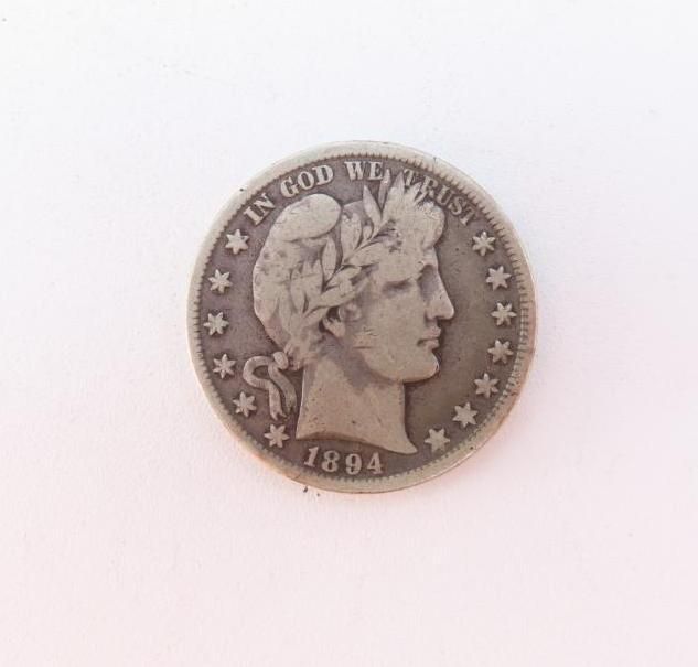 1894 Barber Quarter coin with a profile of Liberty and the inscription