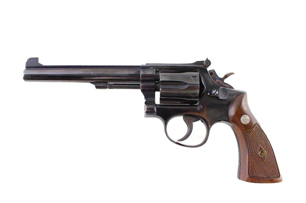 A black revolver with a wooden grip.