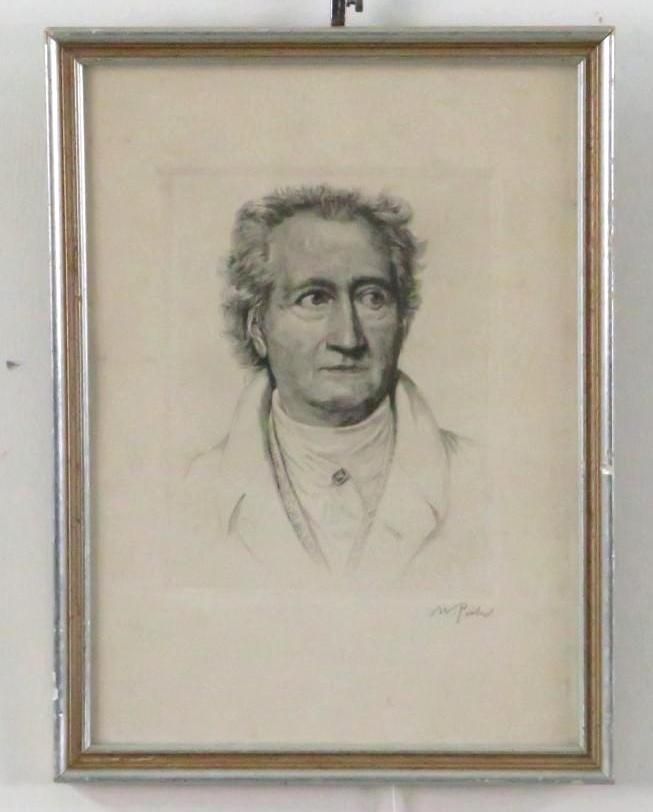 Framed pencil portrait of a man, framed in silver and wood.