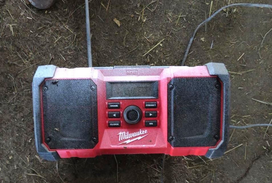 Red and black Milwaukee jobsite radio.