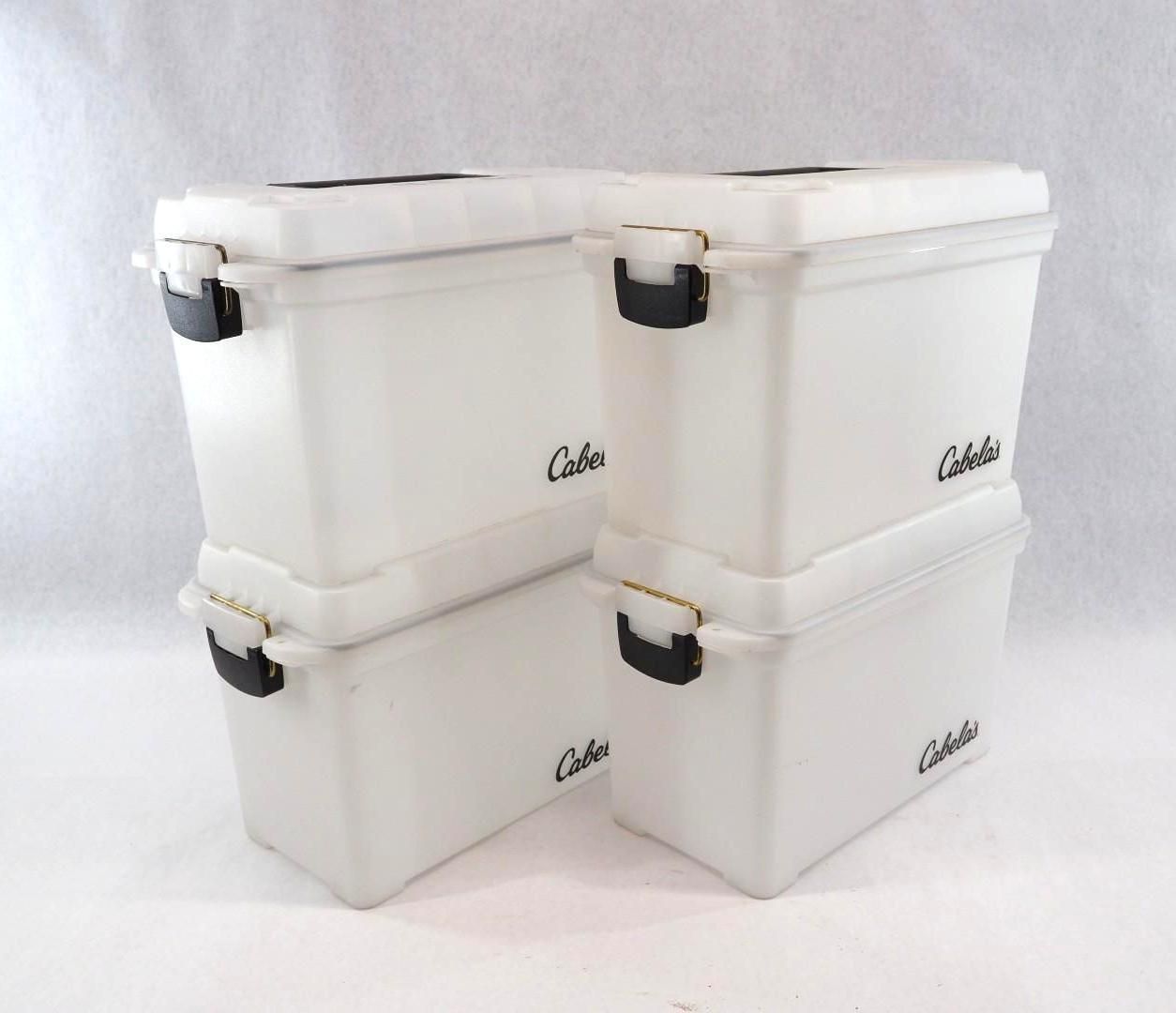 Four white insulated storage boxes stacked two by two on a plain white background