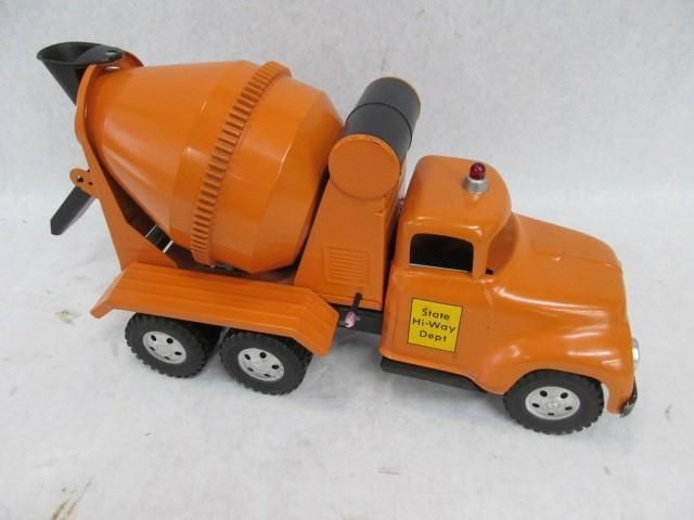 Orange toy cement mixer truck with black drum and tires.