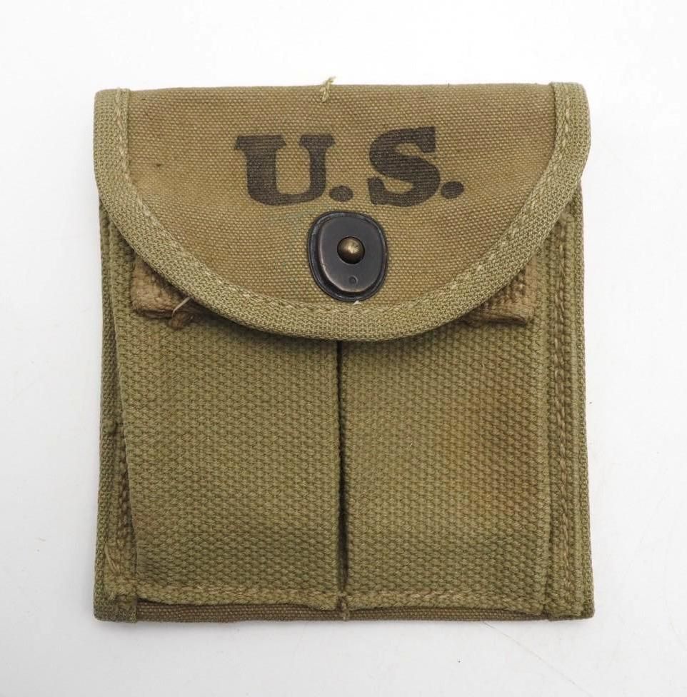 Olive drab U.S. military pouch with button flap, shown closed on a white background