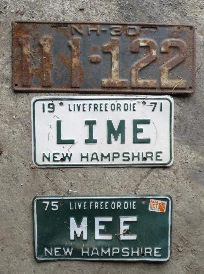 Three old New Hampshire license plates: