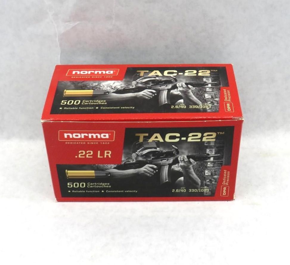 Box of Norma TAC-22 .22 LR ammunition with images of rifles, on a white background.