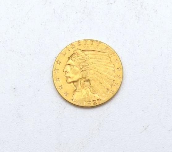 Gold coin with profile of a Native American chief,