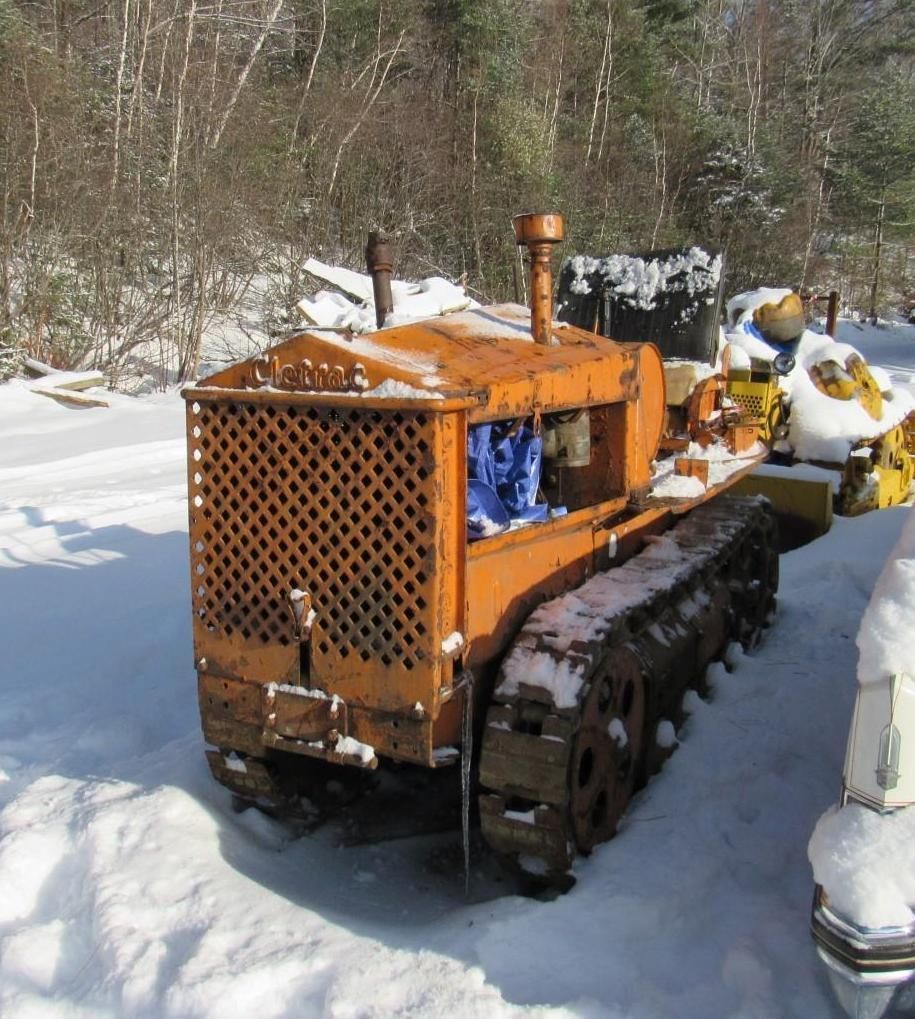 Orange vintage Cleveland Tractor Co. Cletrac Tractor.