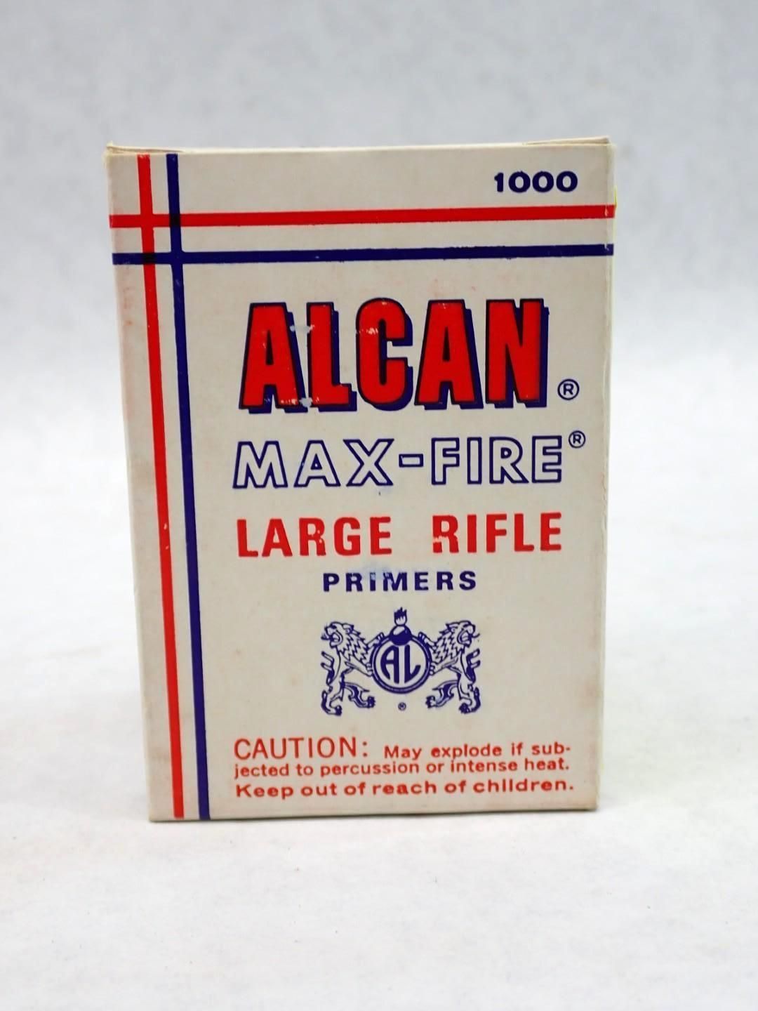 Box of ALCAN MAX-FIRE large rifle primers, white with red and blue lines, text, and warning.
