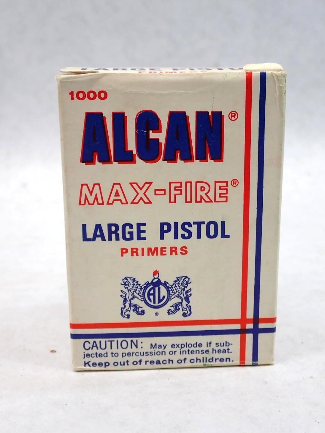 Box of ALCAN MAX-FIRE large pistol primers, with text and warning label, in blue, red, and white.