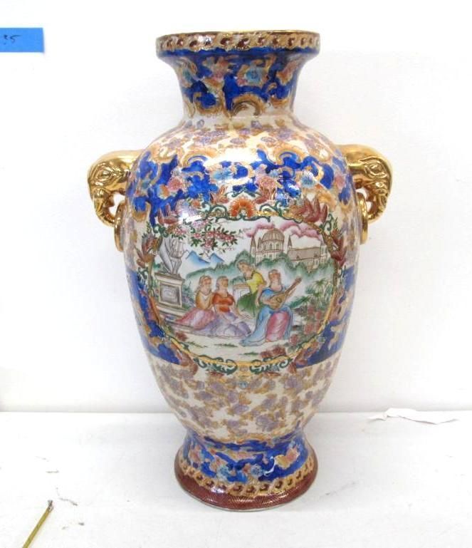 Ornamental Chinese vase with floral and figural painting; gold handles; blue and gold accents.