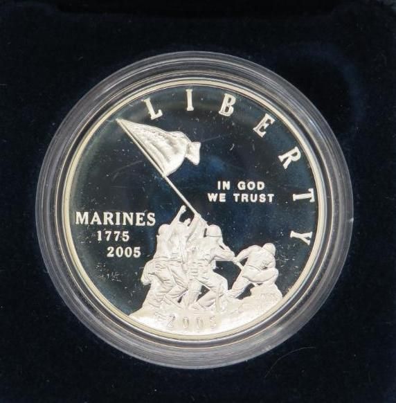 Silver coin with Marines raising American flag, 