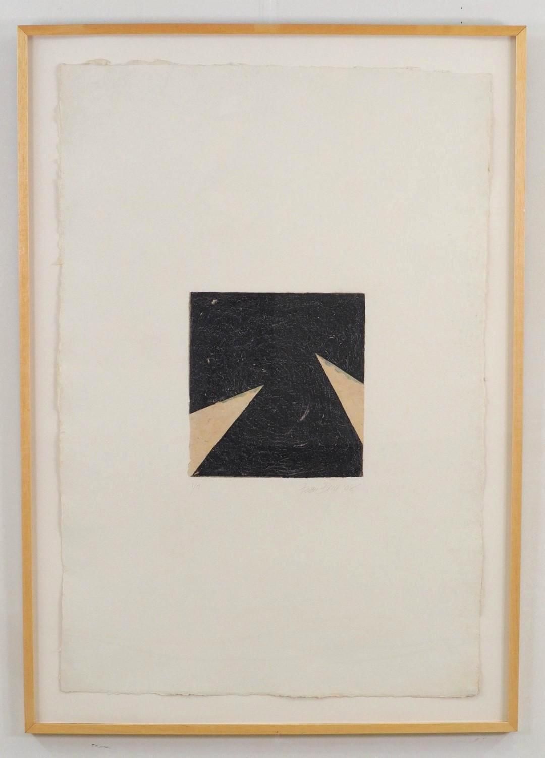 Framed artwork. Black square with two tan triangles on off-white paper.