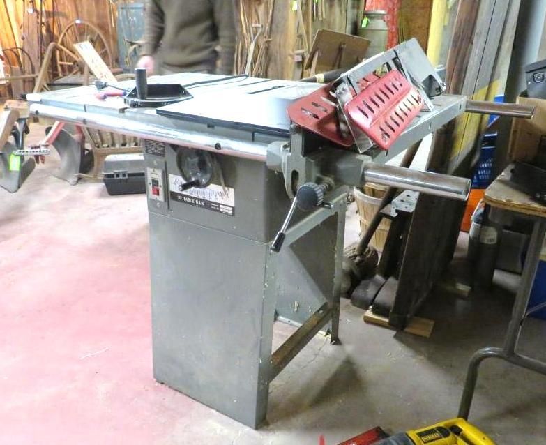 Gray table saw in a workshop.